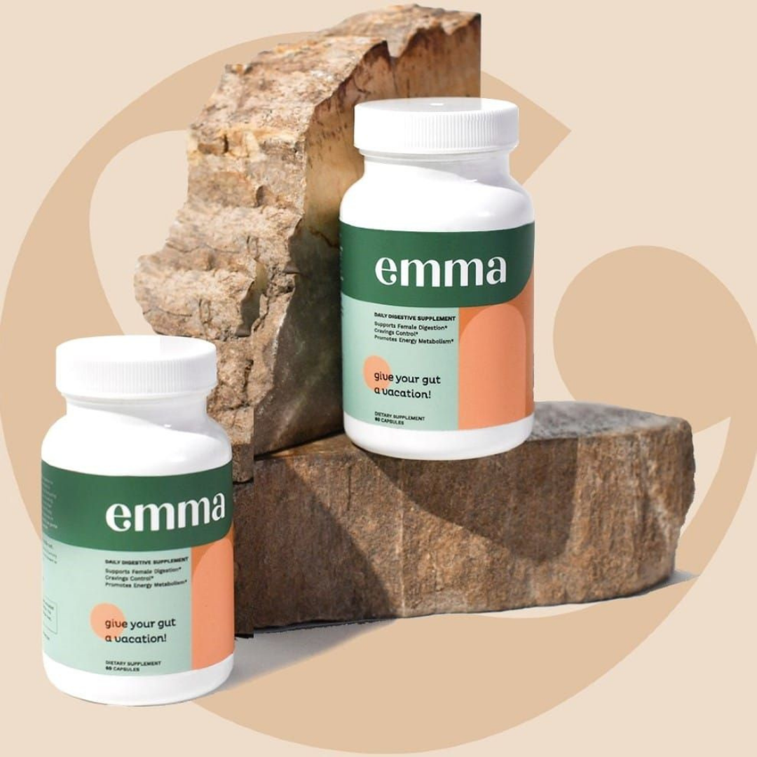 Two bottles of 'emma' on a natural stone background