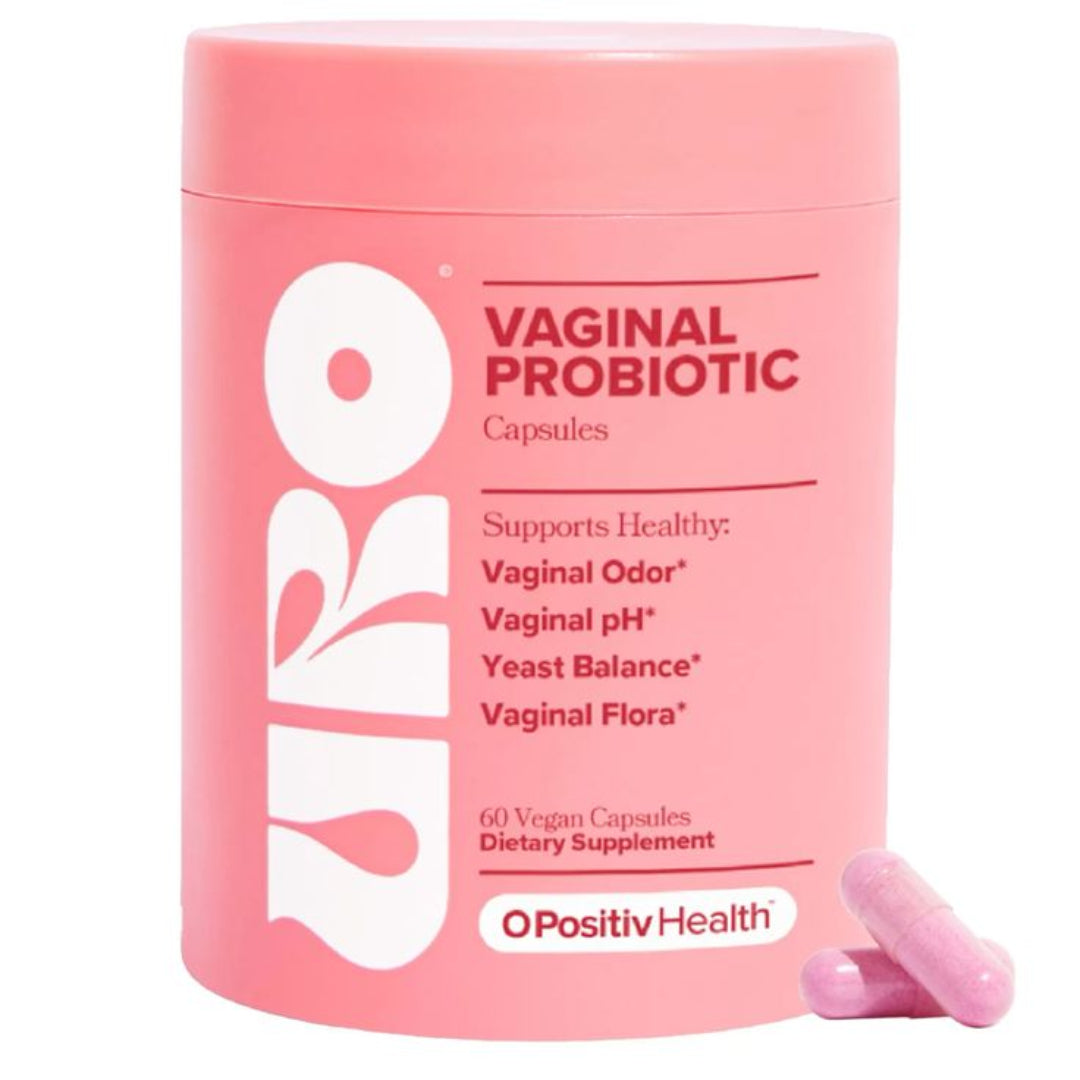 Pink container of vaginal probiotic capsules with 'Opositiv Health' branding on a white background.